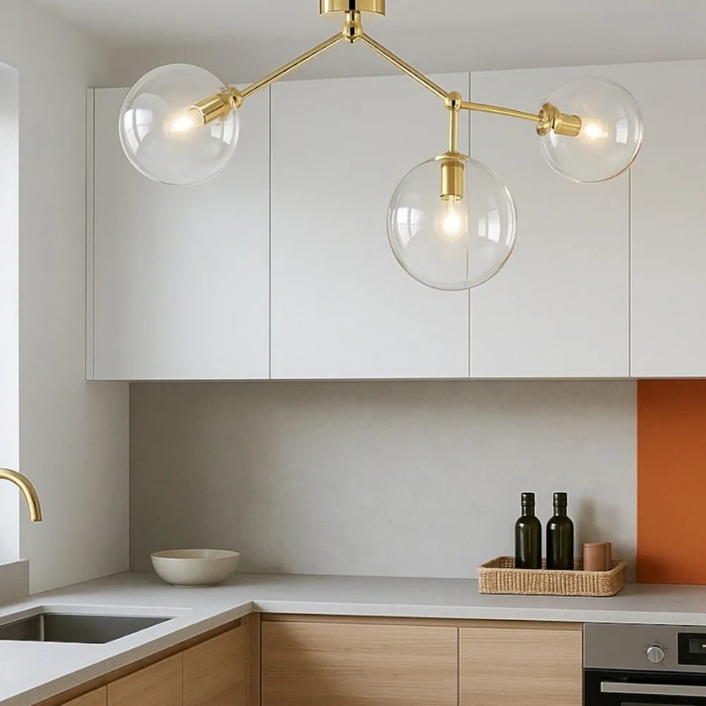 Plafoniere Moderne-Selezionato da Mazzolaluce Plafoniere per cucina moderna oro 3 bocce trasparenti